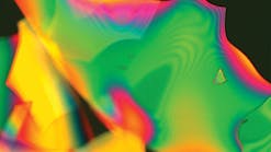 A dielectric multilayer stack coating, measuring 0.5 μm in total thickness, that has been intentionally released from the optic surface before imaging. The image was taken at 200x using a Nomarski microscope.